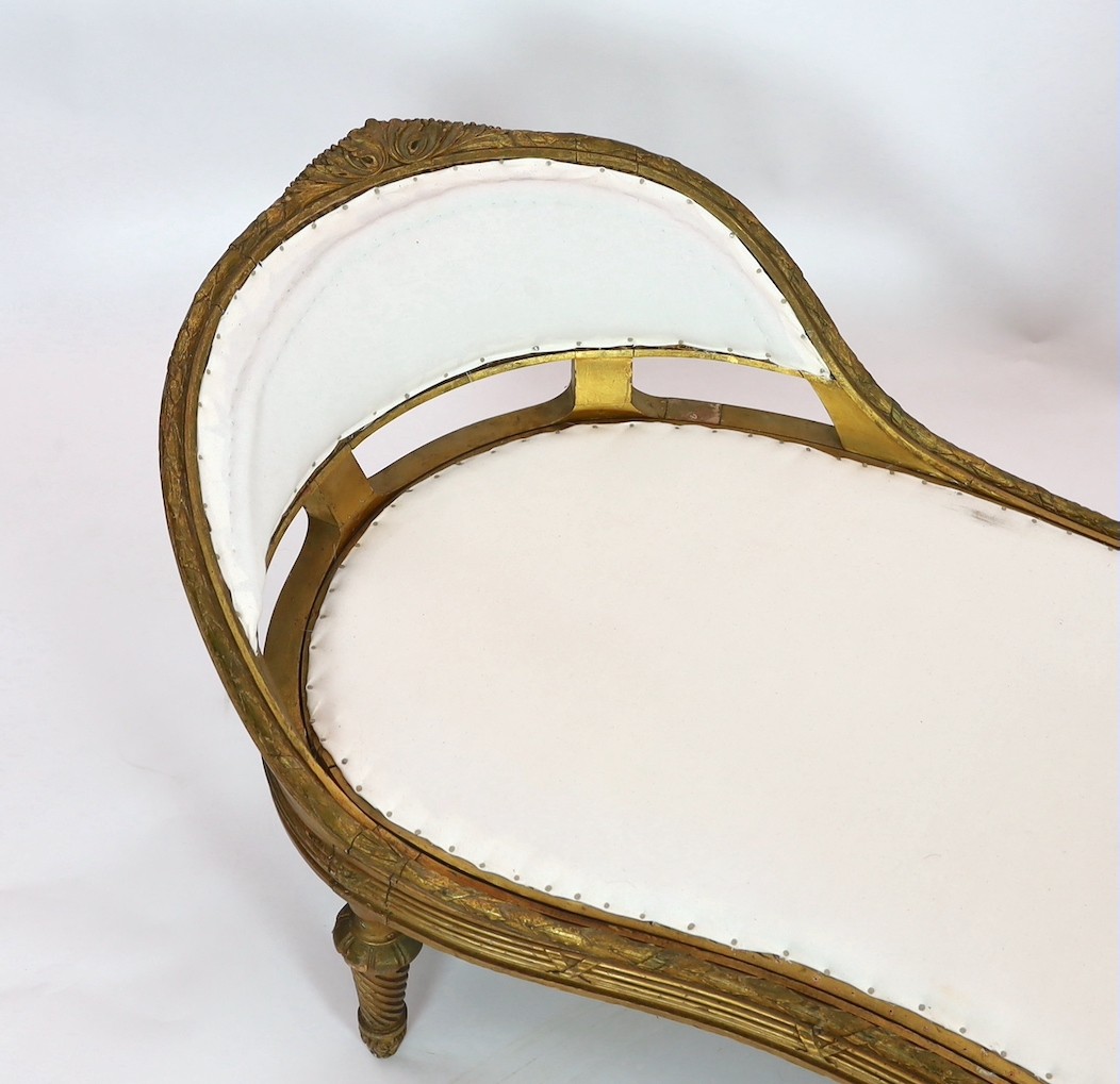 A 19th century Louis XVI style giltwood chaise longue, length 186cm depth 76cm height 95cm